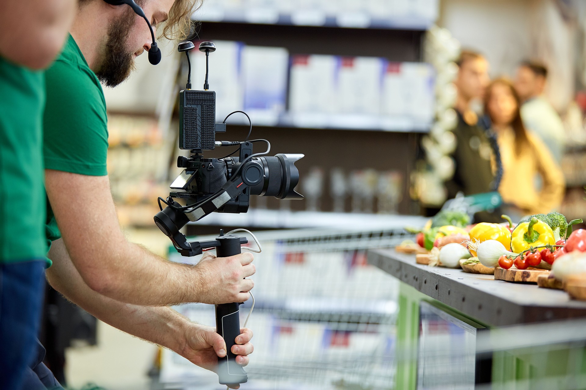Behind the scenes of filming films or video products and the film crew of the film crew on the set in the pavilion of the film studio.
